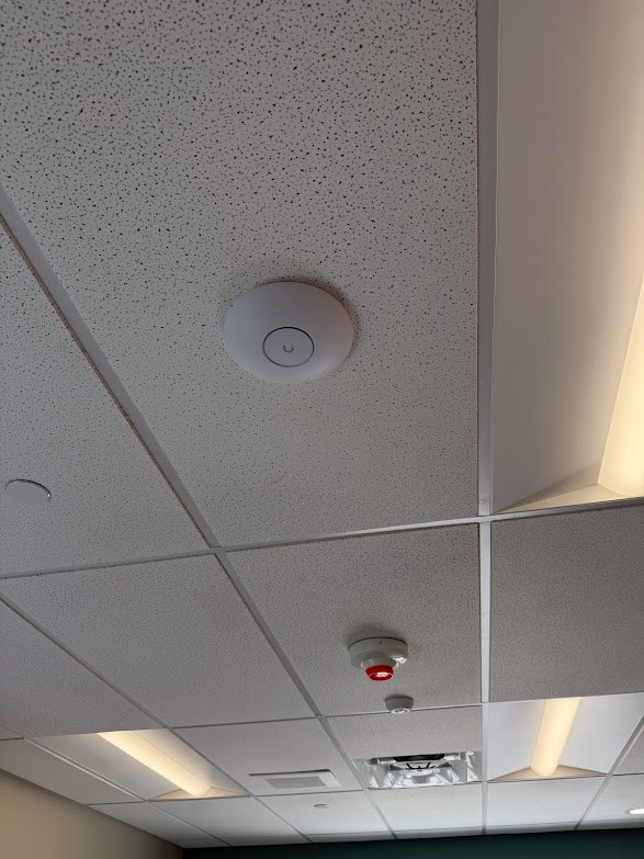 UniFi wireless access point in drop ceiling