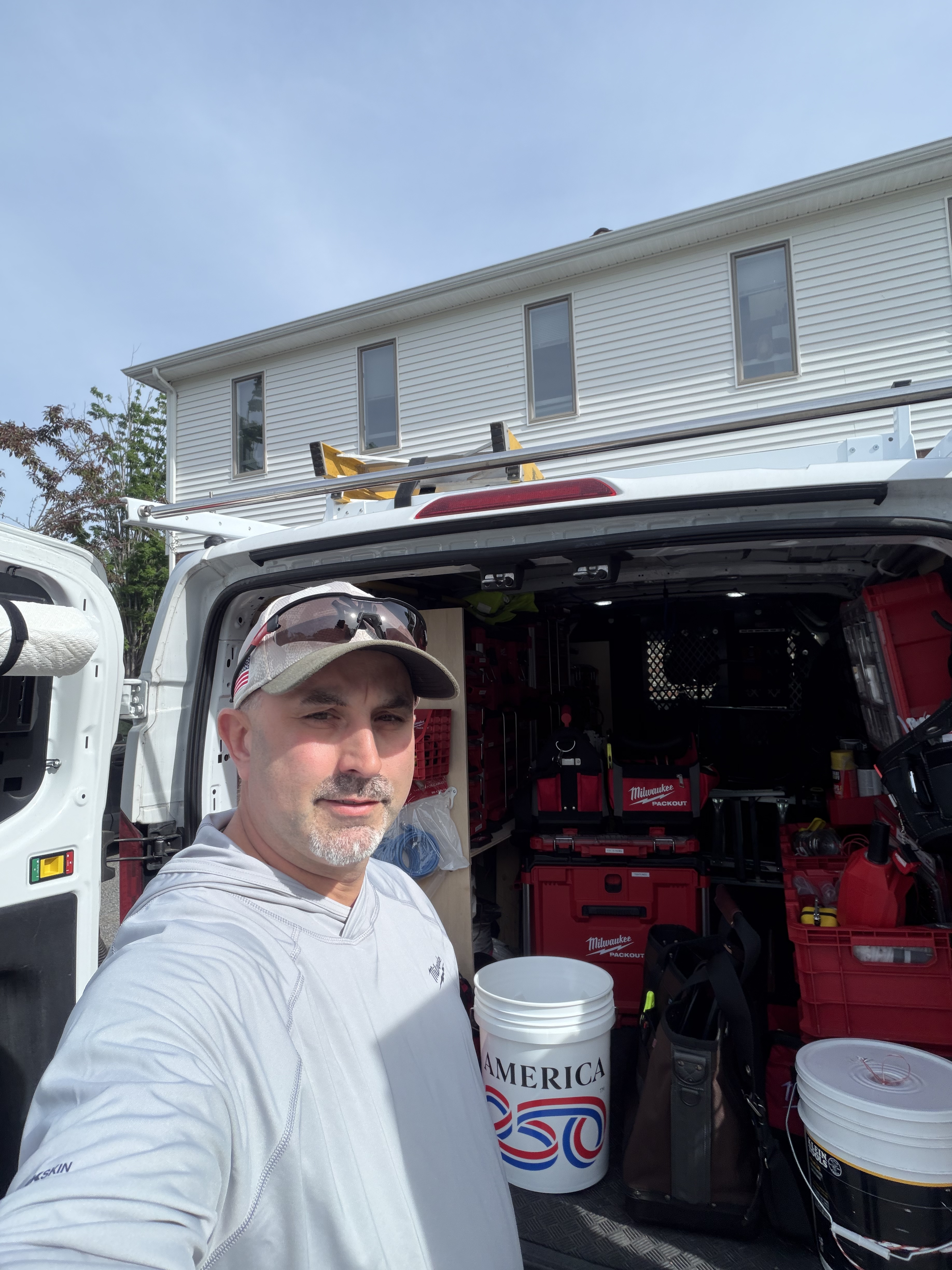 Richard Brideau, Owner of Tightlines Smart Solutions, in front of his work van